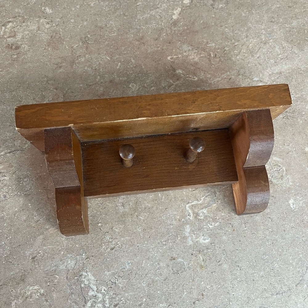 Wooden Wall Shelf in Brown with Peg Hooks